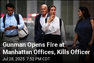 Gunman Opens Fire at Manhattan Offices, Kills Officer