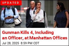 Gunman Opens Fire at Manhattan Offices, Kills Officer