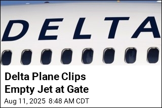 Delta Plane Clips Empty Jet at Gate