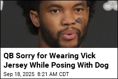 QB Sorry for Wearing Vick Jersey While Posing With Dog