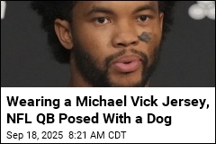 QB Sorry for Wearing Vick Jersey While Posing With Dog