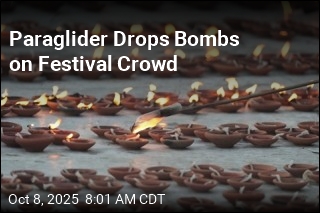 Paraglider Drops Bombs on Festival Crowd