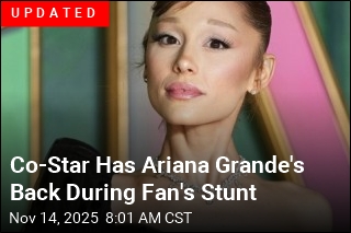 Man Rushes Ariana Grande on Red Carpet