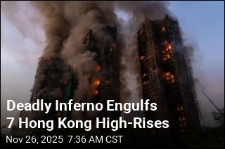 At Least 13 Dead in Fire at Hong Kong High-Rises