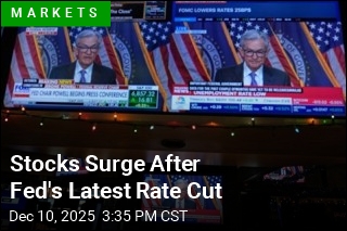 Dow Jumps Almost 500 Points After Fed Rate Cut