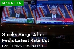 Dow Jumps Almost 500 Points After Fed Rate Cut