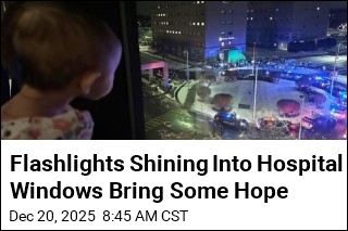 Flashlights Shining Into Hospital Windows Bring Some Joy
