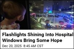Flashlights Shining Into Hospital Windows Bring Some Joy