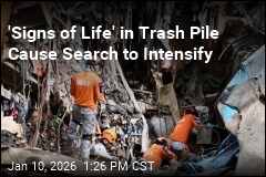 'Signs of Life' in Trash Pile Cause Search to Intensify