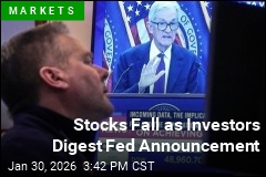 Stocks Fall as Investors Digest Fed Announcement