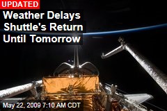 Weather Delays Shuttle's Return Until Tomorrow