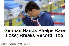 German Hands Phelps Rare Loss; Breaks Record, Too