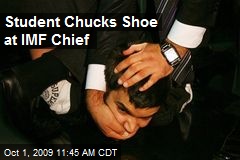 Student Chucks Shoe at IMF Chief