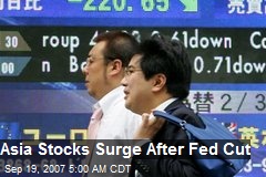Asia Stocks Surge After Fed Cut