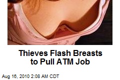 Thieves Flash Breasts to Pull ATM Job