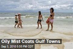 Oily Mist Coats Gulf Towns